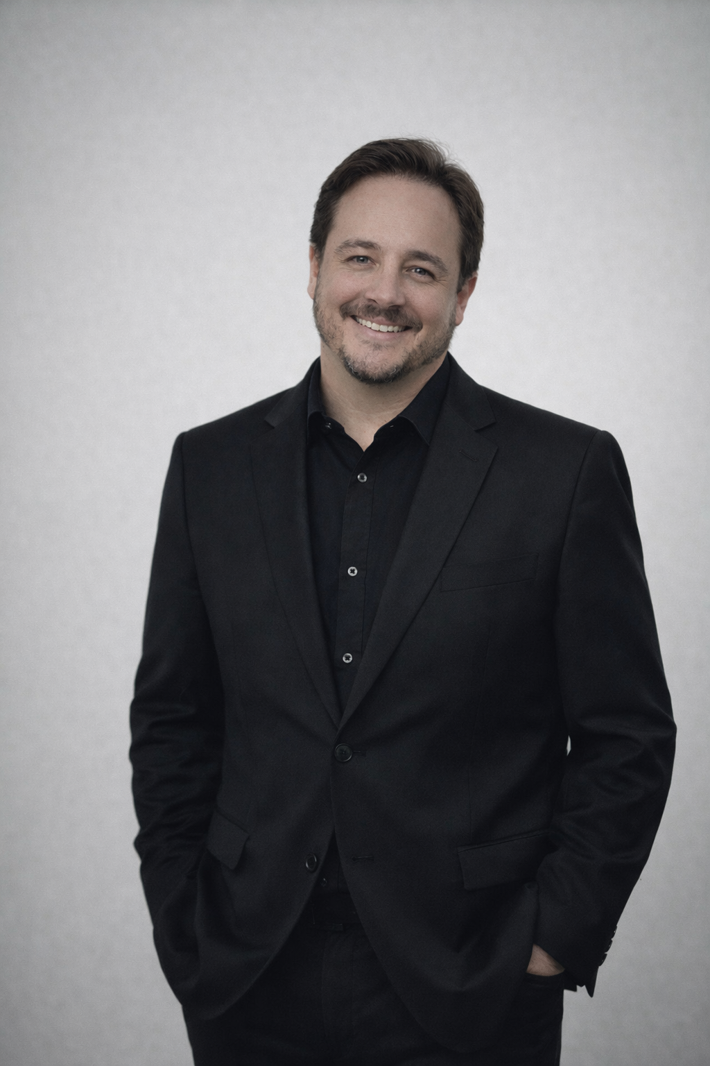 Dave Morris black suit portrait